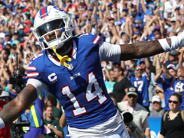 ORCHARD PARK, NEW YORK - OCTOBER 01: Stefon Diggs #14 of the Buffalo Bills celebrates his touchdown reception with Dawson Knox #88 during the second quarter against the Miami Dolphins at Highmark Stadium on October 01, 2023 in Orchard Park, New York.