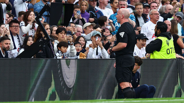 LONDON, ENGLAND - SEPTEMBER 30: Referee Simon Hooper consults VAR during the Premier League match between Tottenham Hotspur and Liverpool FC at Tottenham Hotspur Stadium on September 30, 2023 in London, England.