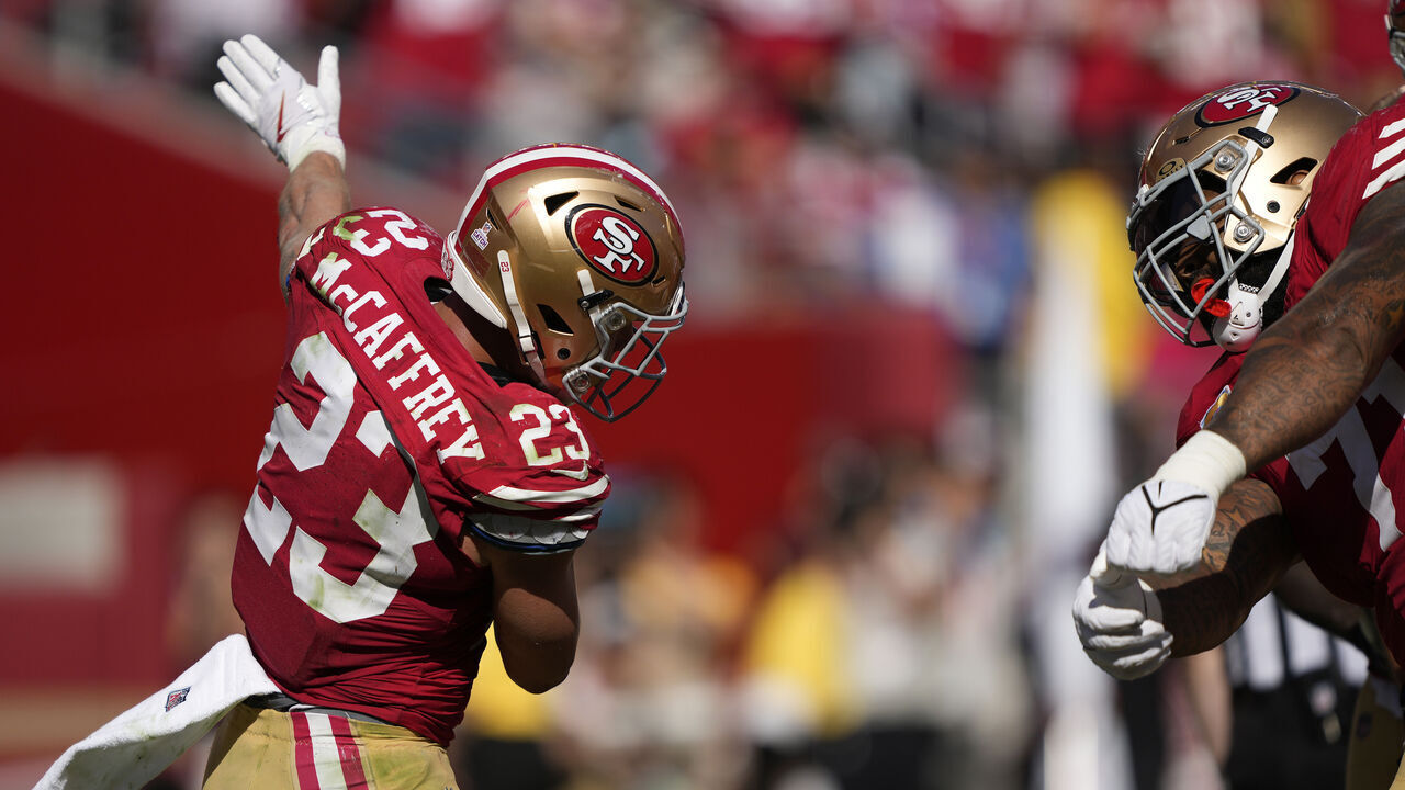 SANTA CLARA, CALIFORNIA - OCTOBER 01: Christian McCaffrey #23 of the San Francisco 49ers celebrates his fourth touchdown of the game against the Arizona Cardinals during the fourth quarter at Levi's Stadium on October 01, 2023 in Santa Clara, California.