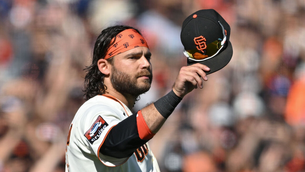SAN FRANCISCO, CALIFORNIA - OCTOBER 1: Brandon Crawford #35 of the San Francisco Giants acknowledges the crowd after he was taken off the field during the ninth inning at Oracle Park on October 1, 2023 in San Francisco, California.