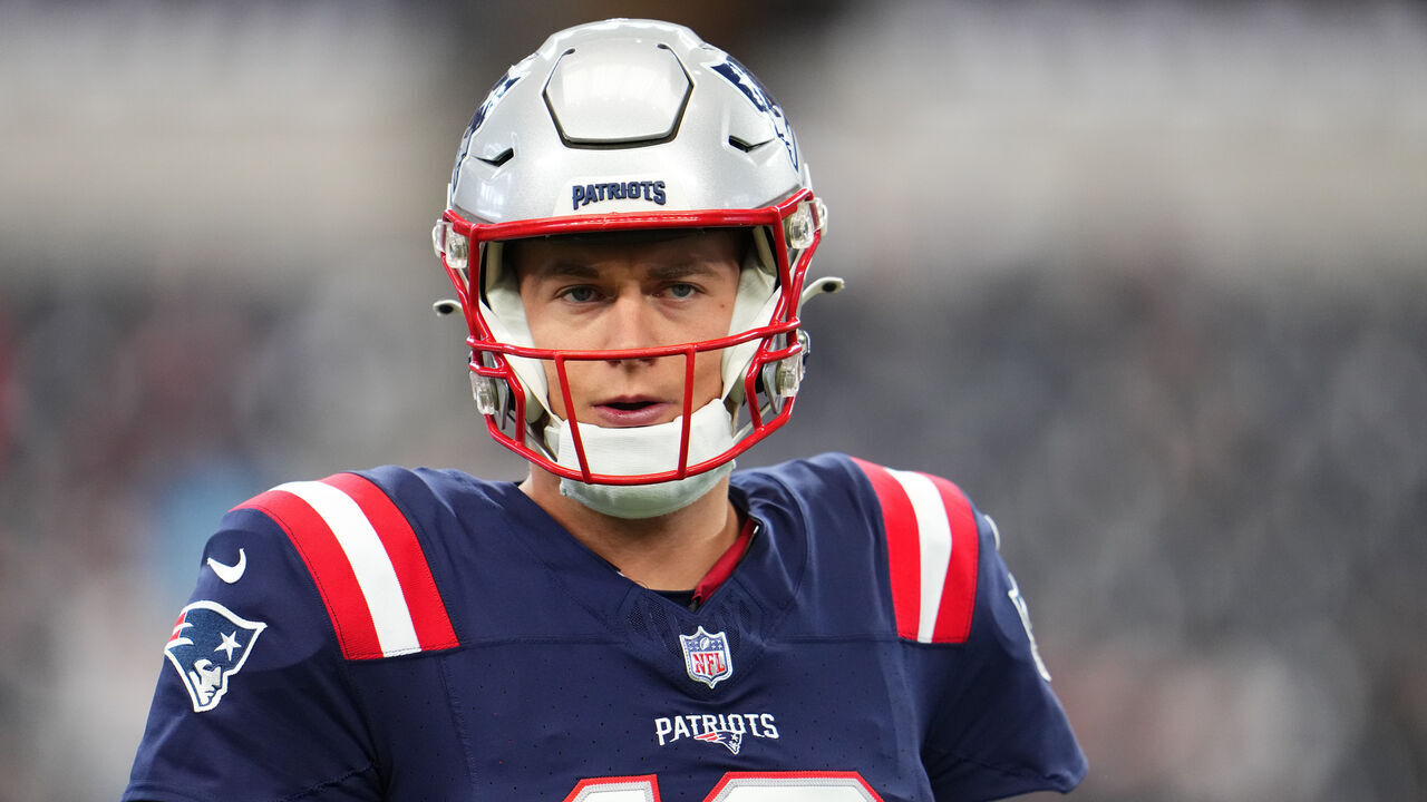 ARLINGTON, TX - OCTOBER 01: Mac Jones #10 of the New England Patriots warms up before kickoff against the Dallas Cowboys at AT&T Stadium on October 1, 2023 in Arlington, Texas.