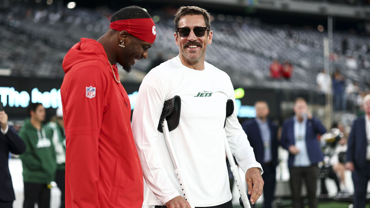EAST RUTHERFORD, NJ - OCTOBER 01: Aaron Rodgers #8 of the New York Jets smiles with Marquez Valdes-Scantling #11 of the Kansas City Chiefs prior to an NFL football game at MetLife Stadium on October 1, 2023 in East Rutherford, New Jersey.
