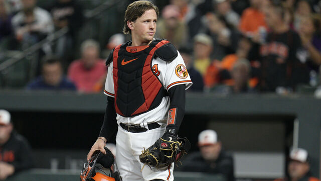 BALTIMORE, MARYLAND - SEPTEMBER 26: Adley Rutschman #35 of the Baltimore Orioles looks on during a video review in the second inning against the Washington Nationals at Oriole Park at Camden Yards on September 26, 2023 in Baltimore, Maryland.