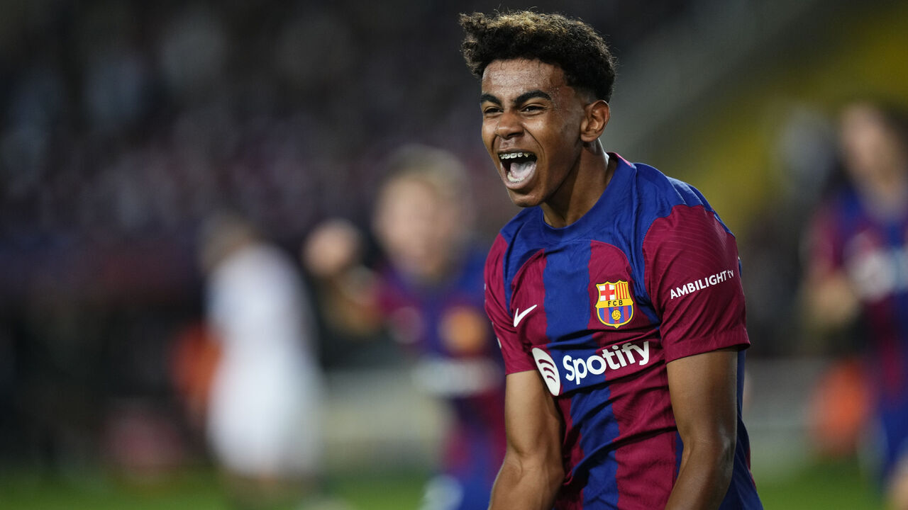 BARCELONA, SPAIN - SEPTEMBER 29: Lamine Yamal right winger of Barcelona and Spain celebrates after scoring his sides first goal during the LaLiga EA Sports match between FC Barcelona and Sevilla FC at Estadi Olimpic Lluis Companys on September 29, 2023 in Barcelona, Spain.