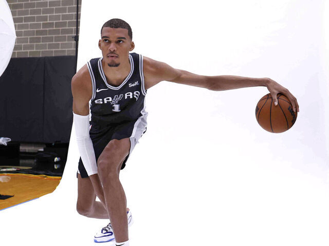 SAN ANTONIO, TX - OCTOBER 02: Victor Wembanyama #1 of the San Antonio Spurs poses for photographs during San Antonio Media Day at 21 Spurs Lane on October 2, 2023 in San Antonio, Texas. NOTE TO USER: User expressly acknowledges and agrees that, by downloading and or using this photograph, User is consenting to terms and conditions of the Getty Images License Agreement.
