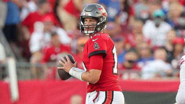 TAMPA, FL - DECEMBER 12: Tampa Bay Buccaneers Quarterback Tom Brady (12) looks for an open receiver during the regular season game between the Buffalo Bills and the Tampa Bay Buccaneers on December 12, 2021 at Raymond James Stadium in Tampa, Florida.