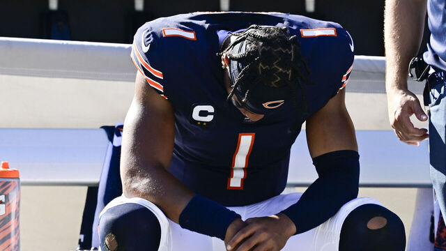CHICAGO, IL - OCTOBER 01: Chicago Bears quarterback Justin Fields (1) dejected on the bench after losing the game against the Denver Broncos at Soldier Field October 01, 2023. The Broncos won 31-28.