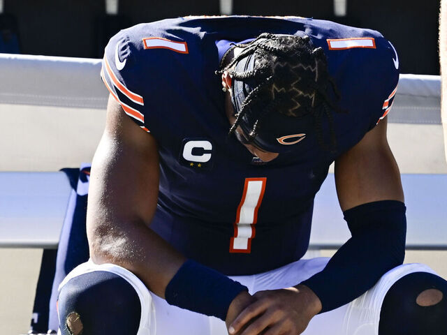 CHICAGO, IL - OCTOBER 01: Chicago Bears quarterback Justin Fields (1) dejected on the bench after losing the game against the Denver Broncos at Soldier Field October 01, 2023. The Broncos won 31-28.