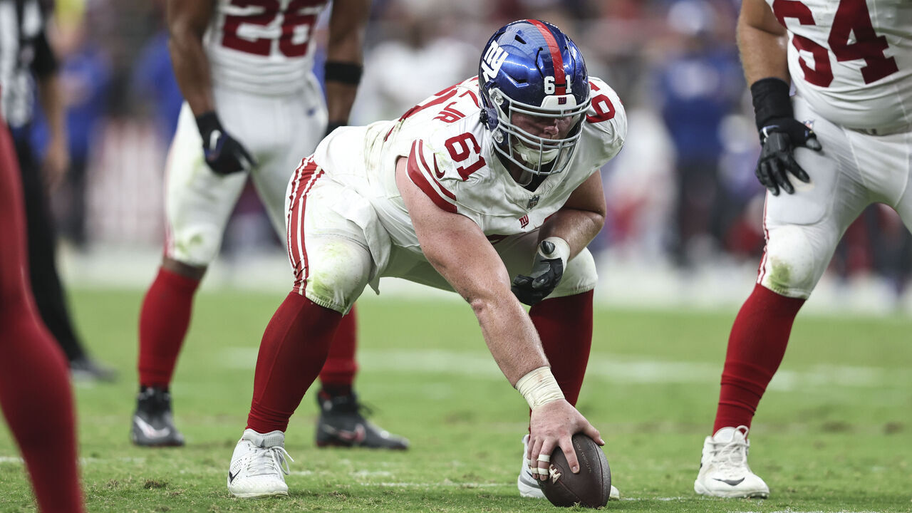 GLENDALE, ARIZONA - SEPTEMBER 17: John Michael Schmitz Jr. #61 of the New York Giants lines up during an NFL football game between the Arizona Cardinals and the New York Giants at State Farm Stadium on September 17, 2023 in Glendale, Arizona.