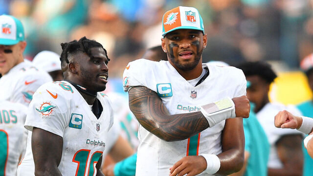 INGLEWOOD, CA - SEPTEMBER 10: Miami Dolphins quarterback Tua Tagovailoa (1) celebrates with Miami Dolphins wide receiver Tyreek Hill (10) during the NFL regular season game between the Miami Dolphins and the Los Angeles Chargers on September 10, 2023, at SoFi Stadium in Inglewood, CA.