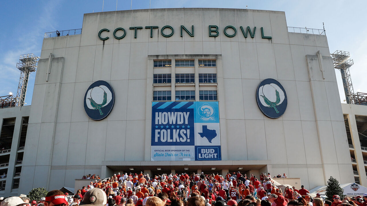 DALLAS, TEXAS - OCTOBER 09: Fans arrive at the Cotton Bowl before the 2021 AT&T Red River Showdown between the Texas Longhorns and the Oklahoma Sooners at Cotton Bowl on October 09, 2021 in Dallas, Texas.