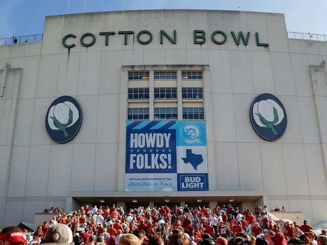 DALLAS, TEXAS - OCTOBER 09: Fans arrive at the Cotton Bowl before the 2021 AT&T Red River Showdown between the Texas Longhorns and the Oklahoma Sooners at Cotton Bowl on October 09, 2021 in Dallas, Texas.