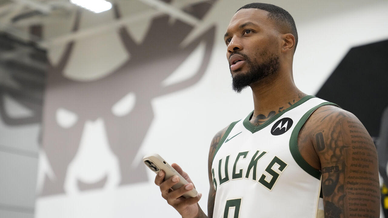 MILWAUKEE, WISCONSIN - OCTOBER 02: Damian Lillard #0 of the Milwaukee Bucks is interviewed during media day on October 02, 2023 in Milwaukee, Wisconsin.
