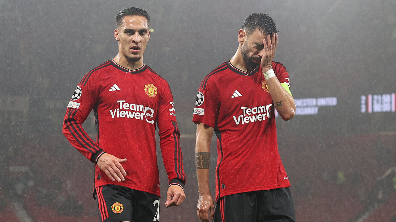 MANCHESTER, ENGLAND - OCTOBER 03: Antony, Bruno Fernandes of Manchester United walks off during the UEFA Champions League match between Manchester United and Galatasaray A.S. at Old Trafford on October 03, 2023 in Manchester, England.