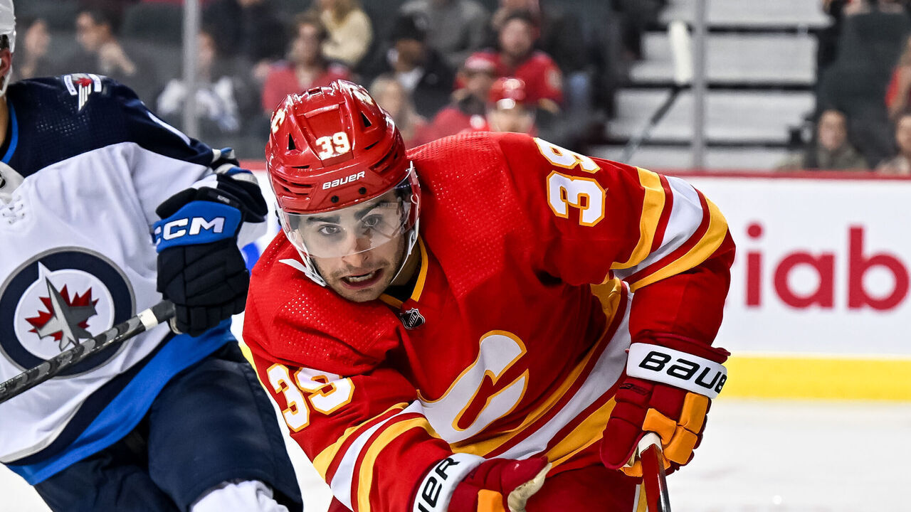 CALGARY, AB - OCTOBER 02: Calgary Flames Right Wing Matthew Coronato (39) in action during the third period of an NHL preseason game between the Calgary Flames and the Winnipeg Jets on October 2, 2023, at the Scotiabank Saddledome in Calgary, AB.