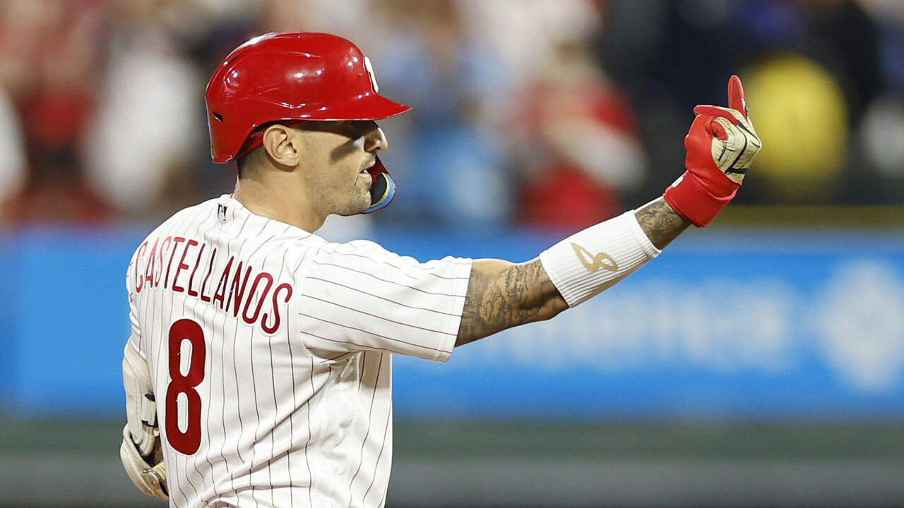 PHILADELPHIA, PENNSYLVANIA - OCTOBER 03: Nick Castellanos #8 of the Philadelphia Phillies gestures after hitting a double during the fourth inning against the Miami Marlins in Game One of the Wild Card Series at Citizens Bank Park on October 03, 2023 in Philadelphia, Pennsylvania.