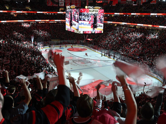 RALEIGH, NC - MAY 11: Fans cheer prior to game 5 of the second round of the Stanley Cup Playoffs between the New Jersey Devils and the Carolina Hurricanes on May 11, 2023 at PNC Arena in Raleigh, North Carolina.