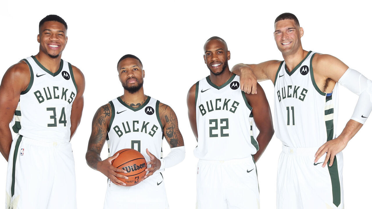 MILWAUKEE, WI - OCTOBER 02: Giannis Antetokounmpo #34, Damian Lillard #0, Khris Middleton #22, and Brook Lopez #11 of the Milwaukee Bucks pose for a portrait during 2023-24 NBA Media Day on October 02, 2023 at the Froedtert & Medical Science of Wisconsin Sports Science Center in Milwaukee, Wisconsin. Mandatory Copyright Notice: Copyright 2023 NBAE