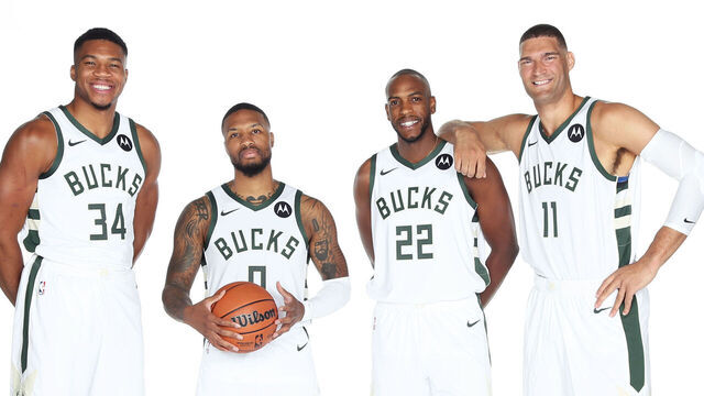 MILWAUKEE, WI - OCTOBER 02: Giannis Antetokounmpo #34, Damian Lillard #0, Khris Middleton #22, and Brook Lopez #11 of the Milwaukee Bucks pose for a portrait during 2023-24 NBA Media Day on October 02, 2023 at the Froedtert & Medical Science of Wisconsin Sports Science Center in Milwaukee, Wisconsin. Mandatory Copyright Notice: Copyright 2023 NBAE