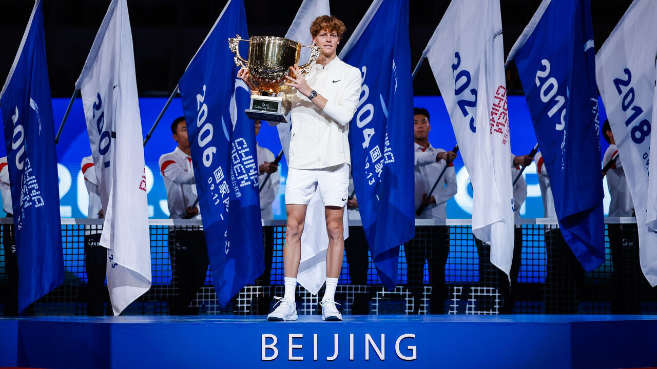 BEIJING, CHINA - OCTOBER 04: Winner Jannik Sinner of Italy poses with the Champion Trophy during the awards ceremony following the Men's Singles Final match against Daniil Medvedev of Russia on day 9 of the 2023 China Open at National Tennis Center on October 4, 2023 in Beijing, China.