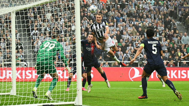 NEWCASTLE UPON TYNE, ENGLAND - OCTOBER 04: Dan Burn of Newcastle United scores the team's second goal during the UEFA Champions League match between Newcastle United FC and Paris Saint-Germain at St. James Park on October 04, 2023 in Newcastle upon Tyne, England.