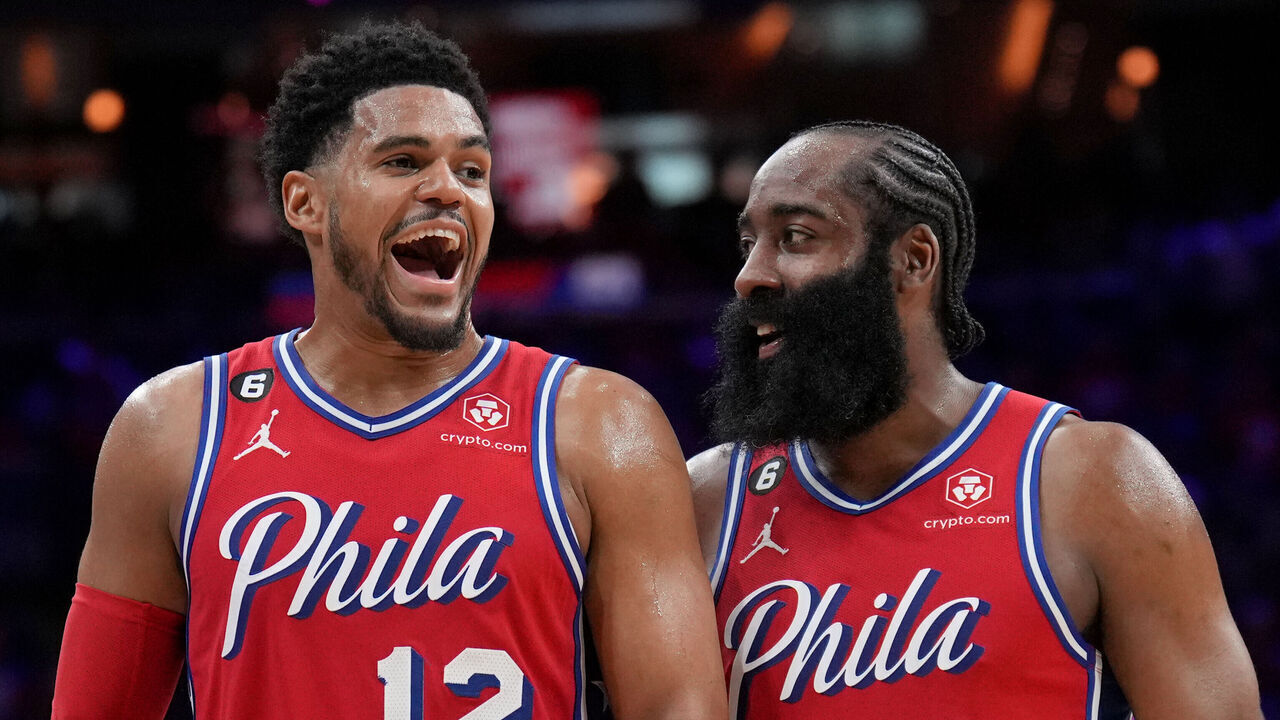 PHILADELPHIA, PA - APRIL 15: Tobias Harris #12 and James Harden #1 of the Philadelphia 76ers look on during the game against the Brooklyn Nets during Round 1 Game 1 of the 2023 NBA Playoffs on April 15, 2023 at the Wells Fargo Center in Philadelphia, Pennsylvania NOTE TO USER: User expressly acknowledges and agrees that, by downloading and/or using this Photograph, user is consenting to the terms and conditions of the Getty Images License Agreement. Mandatory Copyright Notice: Copyright 2023 NBAE