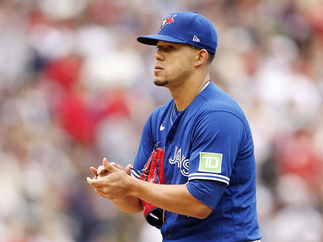 MINNEAPOLIS, MINNESOTA - OCTOBER 04: Jose Berrios #17 of the Toronto Blue Jays prepares to pitch against the Minnesota Twins during the first inning in Game Two of the Wild Card Series at Target Field on October 04, 2023 in Minneapolis, Minnesota.
