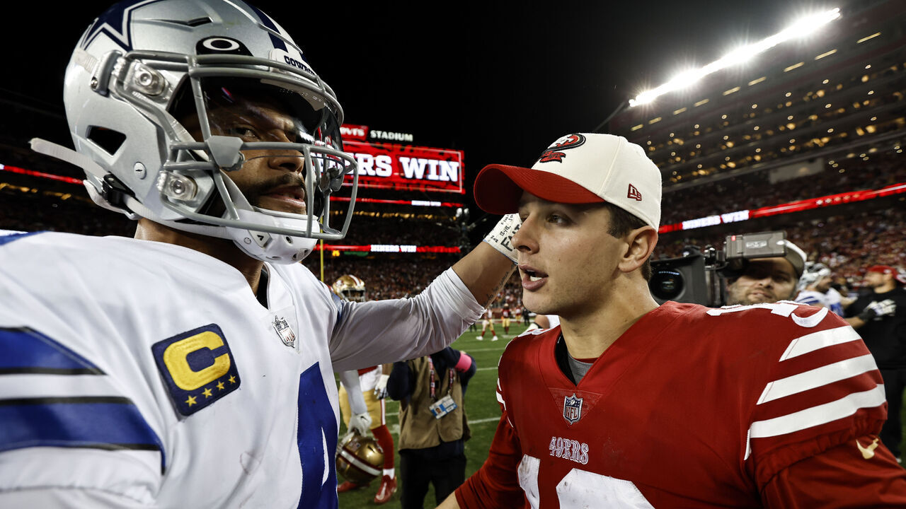 SANTA CLARA, CALIFORNIA - JANUARY 22: Brock Purdy #13 of the San Francisco 49ers meets with Dak Prescott #4 of the Dallas Cowboys following an NFL divisional round playoff football game between the San Francisco 49ers and the Dallas Cowboys at Levi's Stadium on January 22, 2023 in Santa Clara, California.