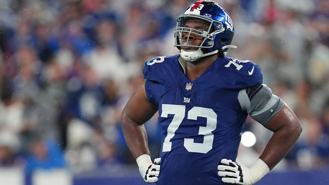 EAST RUTHERFORD, NEW JERSEY - SEPTEMBER 10: Evan Neal #73 of the New York Giants looks on against the Dallas Cowboys at MetLife Stadium on September 10, 2023 in East Rutherford, New Jersey.