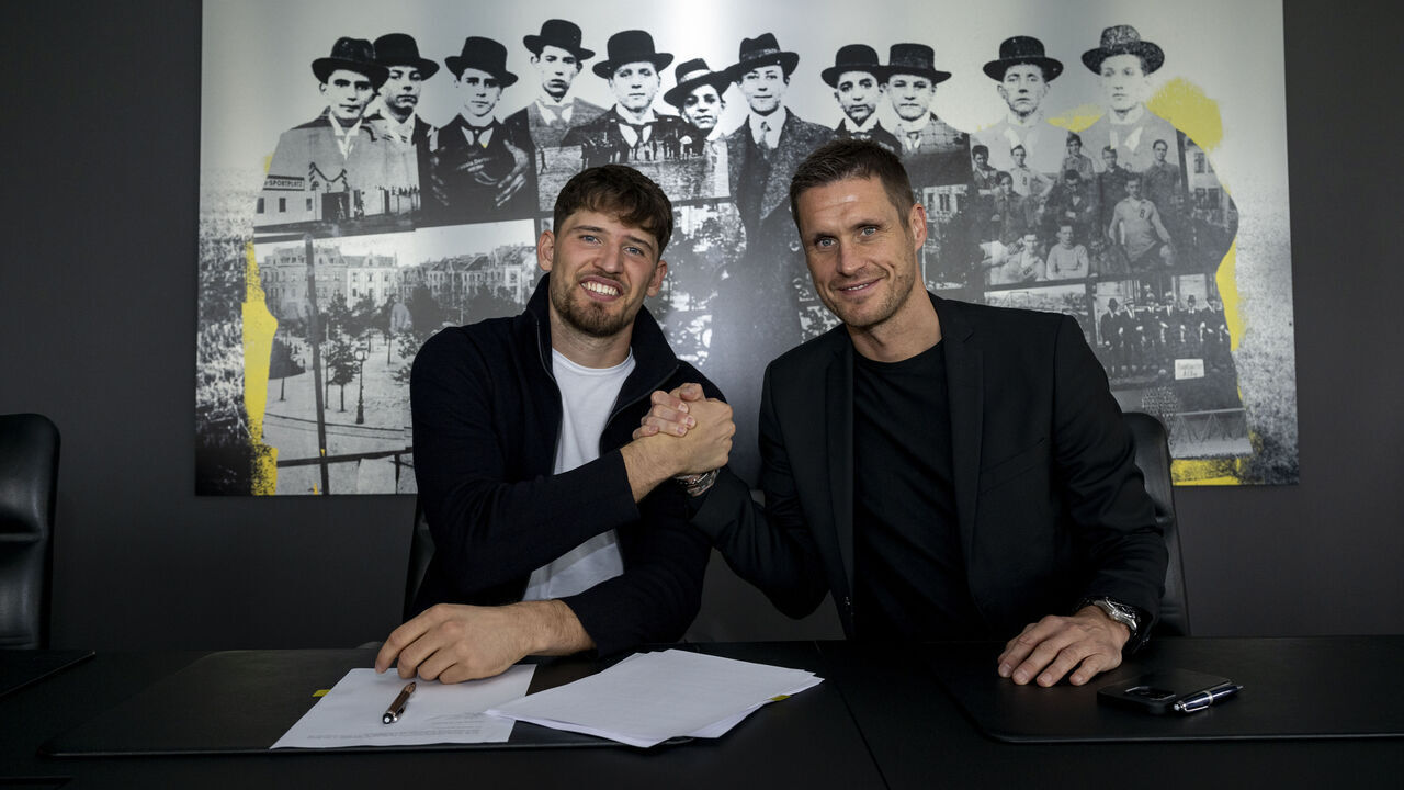 DORTMUND, GERMANY - OCTOBER 5: Gregor Kobel of Borussia Dortmund poses with sporting director Sebastian Kehl after he extended his contract on October 5, 2023 in Dortmund, Germany. Kobel extended his contract at BVB ahead of schedule by a further two years until June 2028.