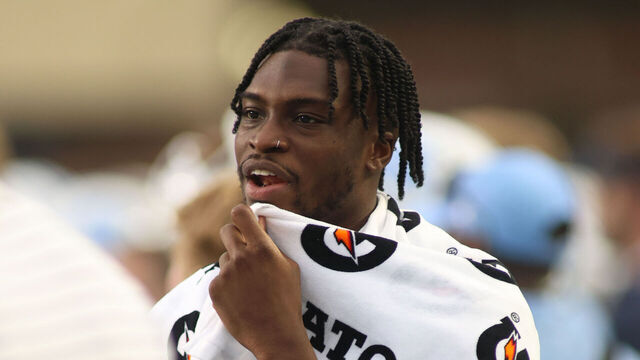CHAPEL HILL, NC - SEPTEMBER 09: North Carolina Tar Heels wide receiver Devontez Walker (9) talks to a coach on the sidelines during the college football game between the North Carolina Tar Heels and the Appalachian State Mountaineers on September 9, 2023 at Kenan Memorial Stadium in Chapel Hill, NC.