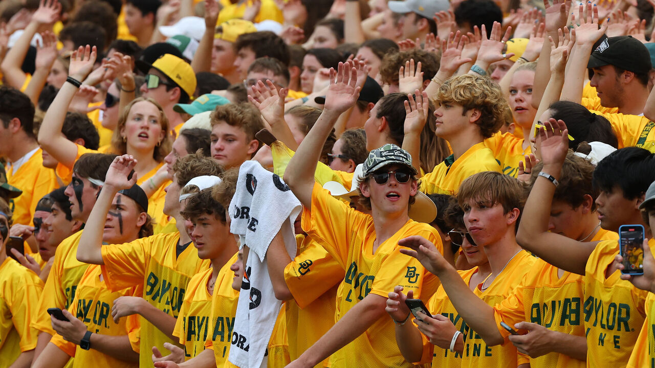 WACO, TEXAS - SEPTEMBER 16: Baylor Bears fans cheer during the game against the Long Island Sharks at McLane Stadium on September 16, 2023 in Waco, Texas.