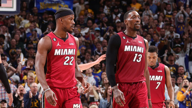 DENVER, CO - JUNE 12: Jimmy Butler #22 and Bam Adebayo #13 of the Miami Heat looks on during the game against the Denver Nuggets during Game Five of the 2023 NBA Finals on June 12, 2023 at Ball Arena in Denver, Colorado. Mandatory Copyright Notice: Copyright 2023 NBAE
