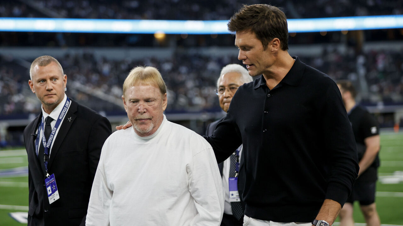 ARLINGTON, TX - AUGUST 26: Las Vegas Raiders owner Mark Davis walks off the field with former NFL quarterback Tom Brady before the preseason game between the Dallas Cowboys and the Las Vegas Raiders on August 26, 2023 at AT&T Stadium in Arlington, Texas.