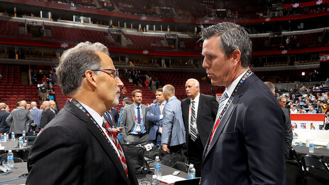 CHICAGO, IL - JUNE 23: Columbus Blue Jackets coach John Tortorella meets with Pittsburgh Penguins coach Mike Sullivan during the 2017 NHL Draft at the United Center on June 23, 2017 in Chicago, Illinois.