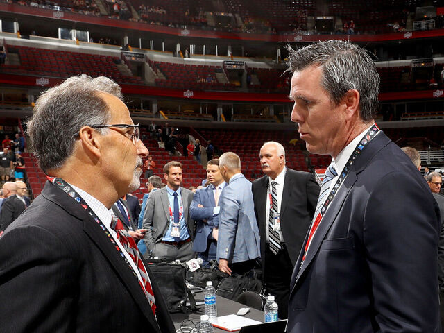 CHICAGO, IL - JUNE 23: Columbus Blue Jackets coach John Tortorella meets with Pittsburgh Penguins coach Mike Sullivan during the 2017 NHL Draft at the United Center on June 23, 2017 in Chicago, Illinois.