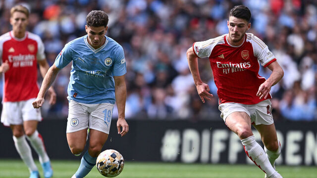 LONDON, ENGLAND - AUGUST 6: Julian Alvarez of Manchester City and Declan Rice of Arsenal in action during The FA Community Shield match between Manchester City against Arsenal at Wembley Stadium on August 6, 2023 in London, England.