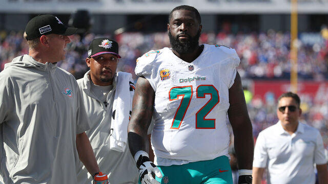 ORCHARD PARK, NEW YORK - OCTOBER 01: Terron Armstead #72 of the Miami Dolphins heads to the locker room after an injury during the first half against the Buffalo Bills at Highmark Stadium on October 01, 2023 in Orchard Park, New York.