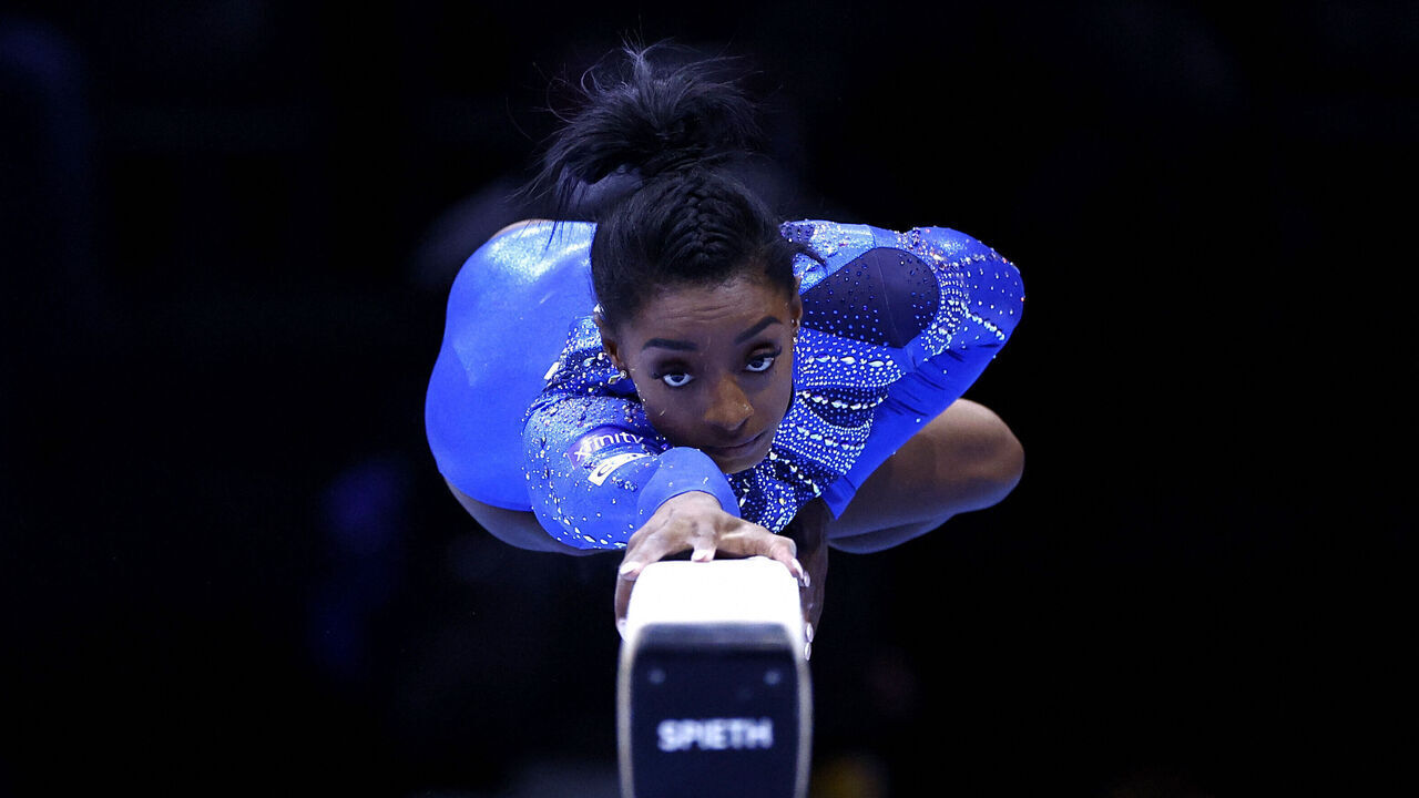 TOPSHOT - US' Simone Biles competes on the Balance Beam in the Women's Individual All-Around Final during the 52nd FIG Artistic Gymnastics World Championships, in Antwerp, northern Belgium, on October 6, 2023.