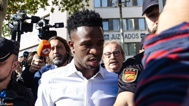 MADRID, SPAIN - OCTOBER 05: The soccer player Vinicius Jr. on his way out after testifying for the racist insults received at Mestalla, at the Courts of Plaza de Castilla, on October 5, 2023, in Madrid, Spain. The footballer testifies by videoconference, as a victim, after the racist insults he received last May 21 at the Mestalla stadium. Vinicius responds today to the questions posed by the head of the Court of Instruction number 10 of Valencia, which investigates this case, as well as those of the other parties involved, including LaLiga, the Royal Spanish Football Federation and Real Madrid, as prosecutors, and those of the defenses of the three young defendants. During the League match played last May 21 between Valencia and Real Madrid at Mestalla, Vinicius denounced having suffered racist insults by some fans who were behind the goal and that meant that the match was stopped for several minutes for this reason.