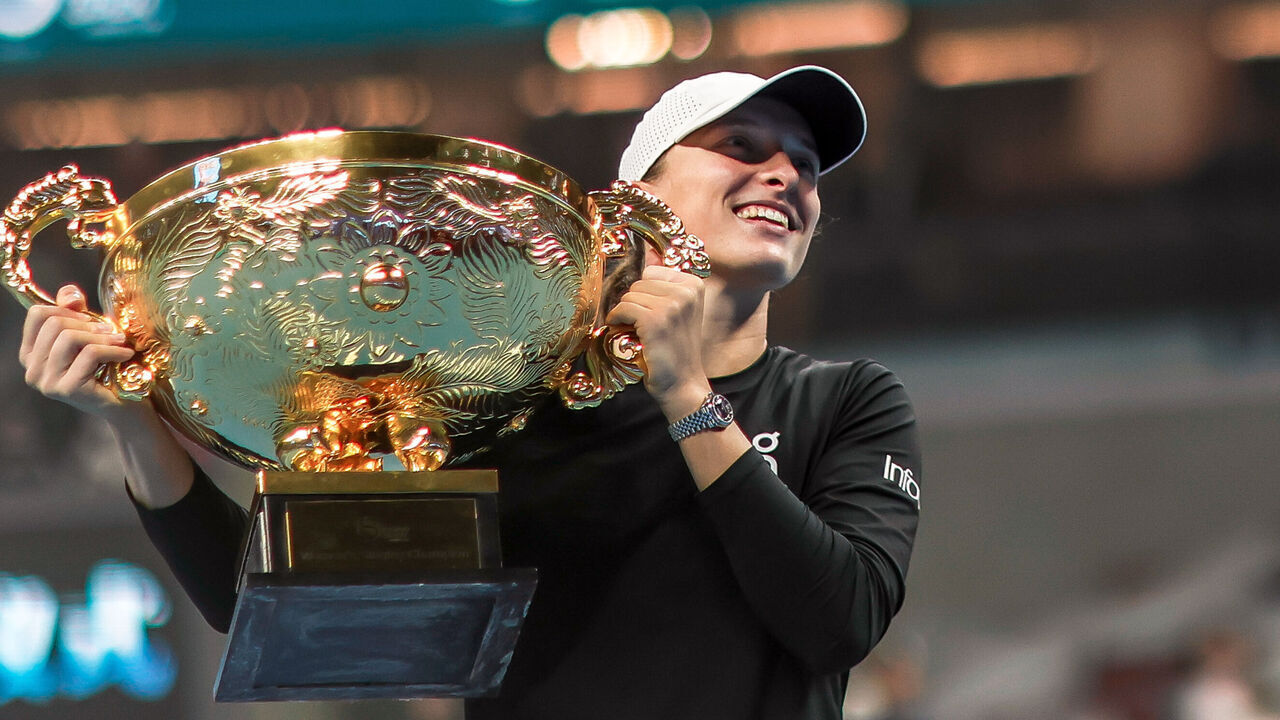 BEIJING, CHINA - OCTOBER 08: Winner Iga Swiatek of Poland poses with the Champion Trophy during the awards ceremony after the Women's Singles Final match on day 13 of 2023 China Open at the National Tennis Center on October 8, 2023 in Beijing, China.