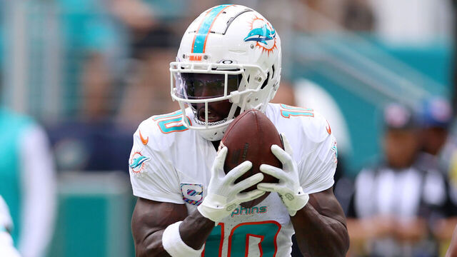 MIAMI GARDENS, FLORIDA - OCTOBER 08: Tyreek Hill #10 of the Miami Dolphins runs the ball against the New York Giants during the first quarter at Hard Rock Stadium on October 08, 2023 in Miami Gardens, Florida.