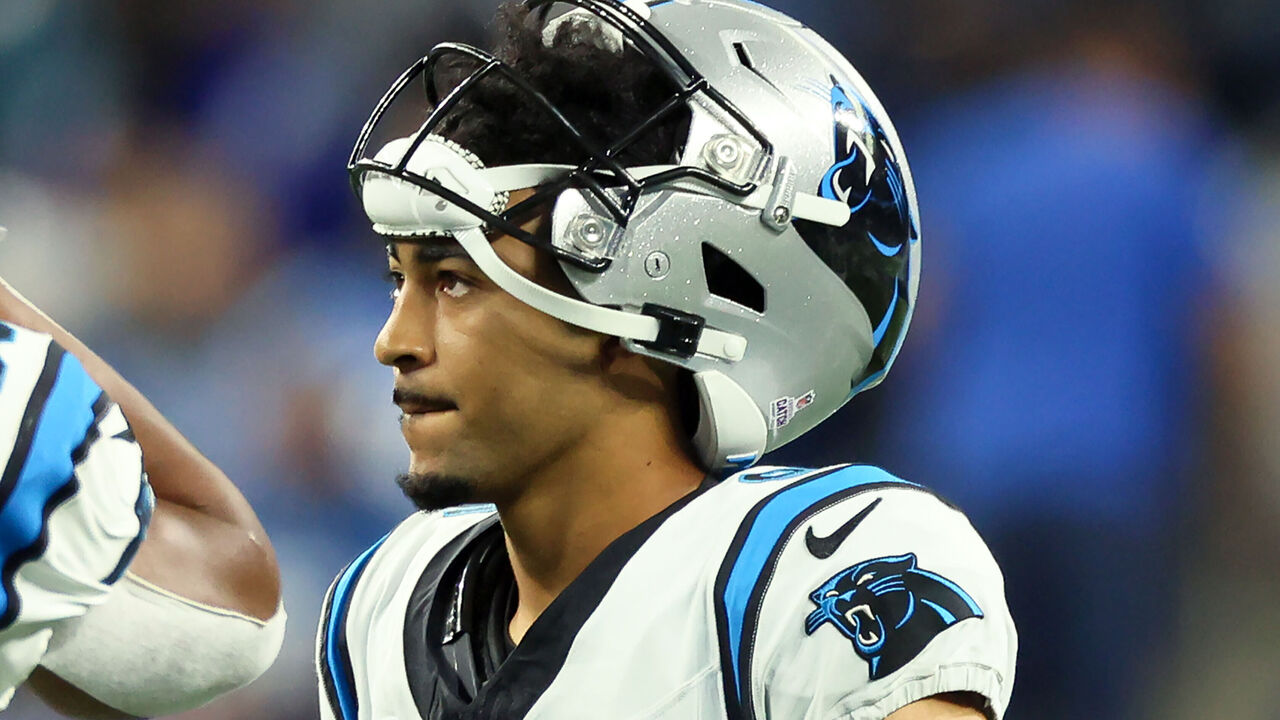 Tommy Tremble of the Carolina Panthers walks off the field