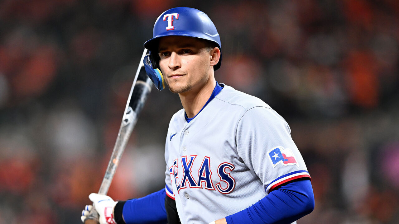 BALTIMORE, MARYLAND - OCTOBER 08: Corey Seager #5 of the Texas Rangers draws a walk for his fifth of the game against the Baltimore Orioles during the ninth inning in Game Two of the Division Series at Oriole Park at Camden Yards on October 08, 2023 in Baltimore, Maryland.