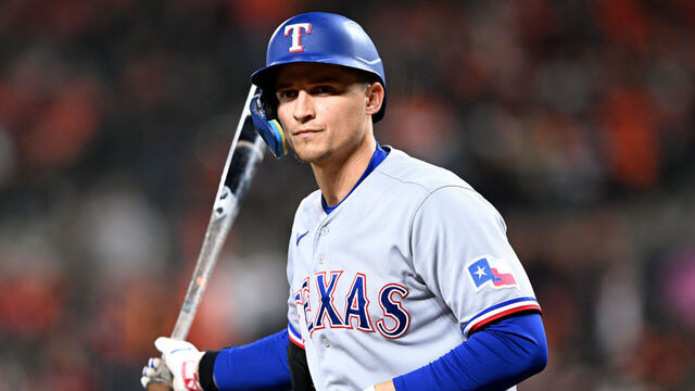 BALTIMORE, MARYLAND - OCTOBER 08: Corey Seager #5 of the Texas Rangers draws a walk for his fifth of the game against the Baltimore Orioles during the ninth inning in Game Two of the Division Series at Oriole Park at Camden Yards on October 08, 2023 in Baltimore, Maryland.