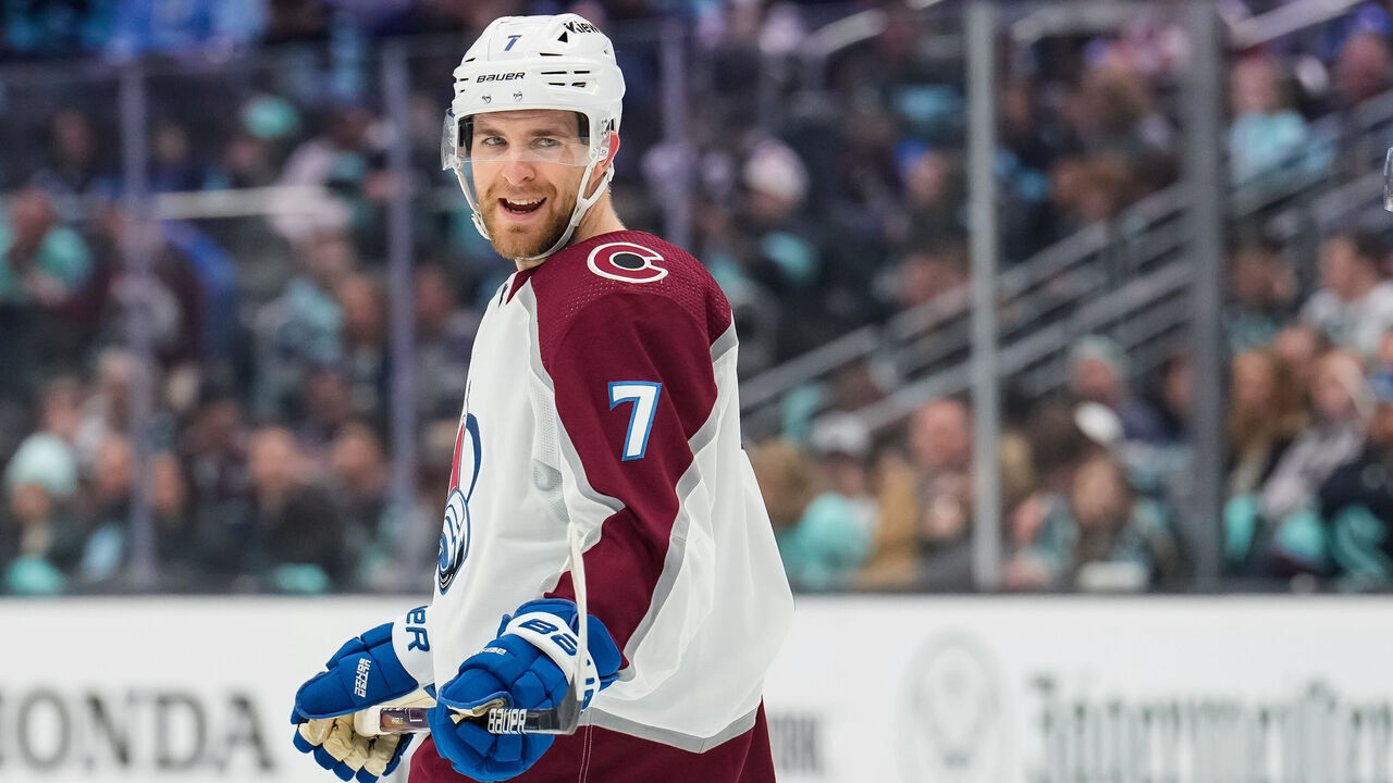 SEATTLE, WASHINGTON - APRIL 22: Devon Toews #7 of the Colorado Avalanche talks with referee Kyle Rehman during the first period against the Seattle Kraken in Game Three of the First Round of the 2023 Stanley Cup Playoffs at Climate Pledge Arena on April 22, 2023 in Seattle, Washington.