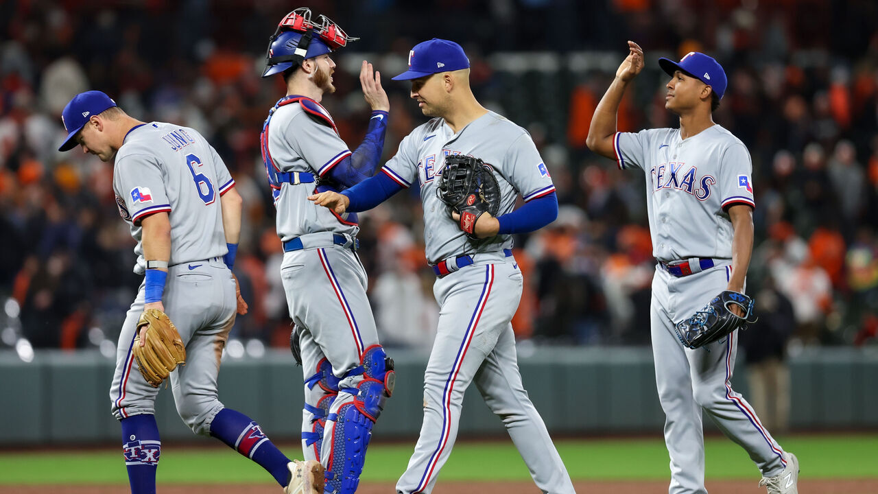 BALTIMORE, MD - OCTOBER 08: Josh Jung #6, Jonah Heim #28, Nathaniel Lowe #30 and Jose Leclerc #25 of the Texas Rangers celebrate after winning Game 2 of the Division Series against the Baltimore Orioles at Oriole Park at Camden Yards on Sunday, October 8, 2023 in Baltimore, Maryland. The Rangers won 11-8.