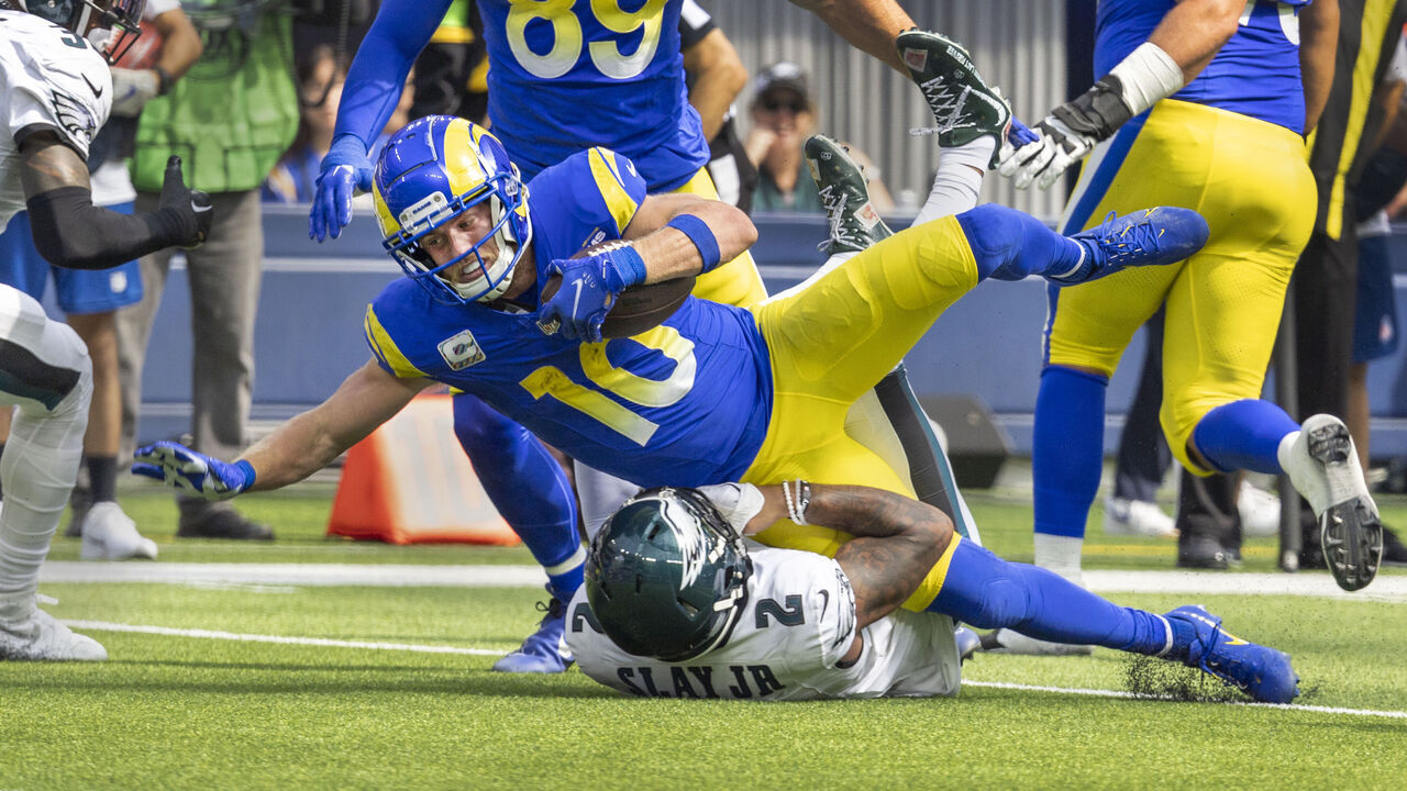 Inglewood, CA - October 08: Los Angeles Rams wide receiver Cooper Kupp rushes over Philadelphia Eagles cornerback Darius Slay in the first half at SoFi Stadium on Sunday, Oct. 8, 2023, in Inglewood, CA. (Allen J. Schaben / Los Angeles Times via Getty Images)