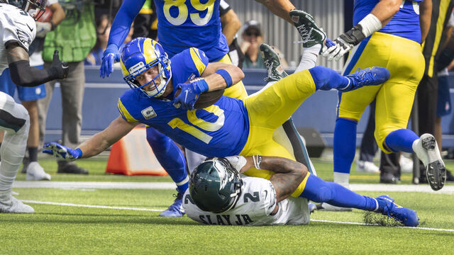 Inglewood, CA - October 08: Los Angeles Rams wide receiver Cooper Kupp rushes over Philadelphia Eagles cornerback Darius Slay in the first half at SoFi Stadium on Sunday, Oct. 8, 2023, in Inglewood, CA. (Allen J. Schaben / Los Angeles Times via Getty Images)