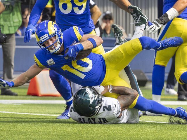 Inglewood, CA - October 08: Los Angeles Rams wide receiver Cooper Kupp rushes over Philadelphia Eagles cornerback Darius Slay in the first half at SoFi Stadium on Sunday, Oct. 8, 2023, in Inglewood, CA. (Allen J. Schaben / Los Angeles Times via Getty Images)